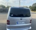 Серый Фольксваген Мультиван, объемом двигателя 2.5 л и пробегом 340 тыс. км за 8700 $, фото 2 на Automoto.ua