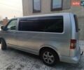 Серый Фольксваген Мультиван, объемом двигателя 2.5 л и пробегом 290 тыс. км за 11300 $, фото 1 на Automoto.ua