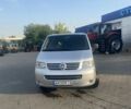 Серый Фольксваген Мультиван, объемом двигателя 2.5 л и пробегом 340 тыс. км за 8700 $, фото 1 на Automoto.ua