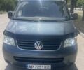 Серый Фольксваген Мультиван, объемом двигателя 2.5 л и пробегом 348 тыс. км за 11500 $, фото 1 на Automoto.ua
