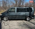 Серый Фольксваген Мультиван, объемом двигателя 2.5 л и пробегом 348 тыс. км за 9940 $, фото 3 на Automoto.ua