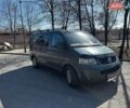 Серый Фольксваген Мультиван, объемом двигателя 2.5 л и пробегом 348 тыс. км за 9940 $, фото 2 на Automoto.ua