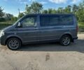 Серый Фольксваген Мультиван, объемом двигателя 2.5 л и пробегом 380 тыс. км за 13000 $, фото 3 на Automoto.ua
