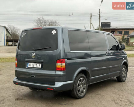 Серый Фольксваген Мультиван, объемом двигателя 2.5 л и пробегом 322 тыс. км за 14350 $, фото 3 на Automoto.ua