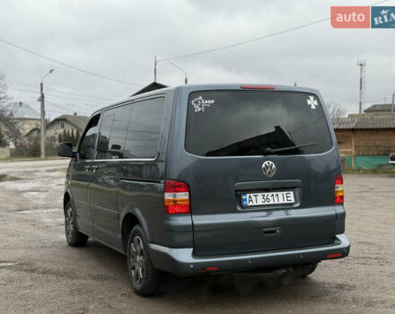 Серый Фольксваген Мультиван, объемом двигателя 2.5 л и пробегом 322 тыс. км за 14350 $, фото 4 на Automoto.ua