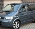 Сірий Фольксваген Мультиван, об'ємом двигуна 2.5 л та пробігом 230 тис. км за 7900 $, фото 1 на Automoto.ua