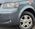 Серый Фольксваген Мультиван, объемом двигателя 2.5 л и пробегом 250 тыс. км за 14499 $, фото 7 на Automoto.ua