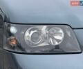 Серый Фольксваген Мультиван, объемом двигателя 2.5 л и пробегом 250 тыс. км за 14499 $, фото 3 на Automoto.ua