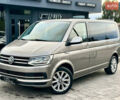 Серый Фольксваген Мультиван, объемом двигателя 2 л и пробегом 208 тыс. км за 44888 $, фото 1 на Automoto.ua