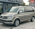 Серый Фольксваген Мультиван, объемом двигателя 2 л и пробегом 208 тыс. км за 44888 $, фото 1 на Automoto.ua