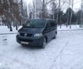 Серый Фольксваген Мультиван, объемом двигателя 2.5 л и пробегом 330 тыс. км за 15000 $, фото 1 на Automoto.ua