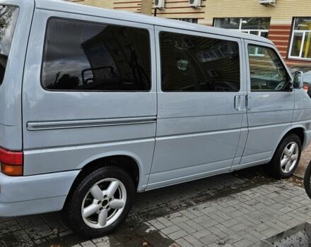 Серый Фольксваген Мультиван, объемом двигателя 2.5 л и пробегом 420 тыс. км за 12000 $, фото 1 на Automoto.ua