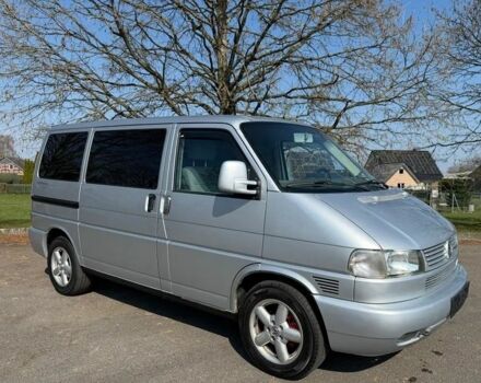 Серый Фольксваген Мультиван, объемом двигателя 2.5 л и пробегом 260 тыс. км за 7500 $, фото 1 на Automoto.ua