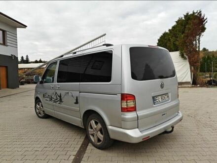 Серый Фольксваген Мультиван, объемом двигателя 2.5 л и пробегом 270 тыс. км за 4200 $, фото 1 на Automoto.ua