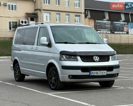 Серый Фольксваген Мультиван, объемом двигателя 2.5 л и пробегом 260 тыс. км за 13800 $, фото 1 на Automoto.ua
