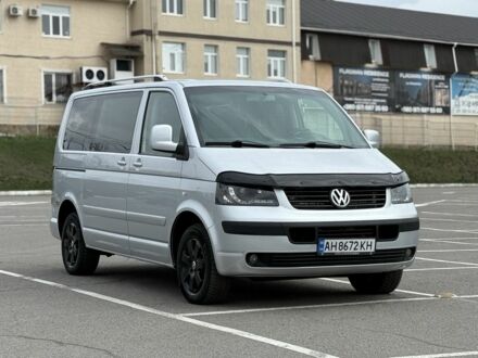 Серый Фольксваген Мультиван, объемом двигателя 2.5 л и пробегом 260 тыс. км за 13800 $, фото 1 на Automoto.ua