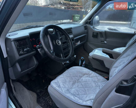 Синій Фольксваген Мультиван, об'ємом двигуна 2.46 л та пробігом 230 тис. км за 9200 $, фото 2 на Automoto.ua