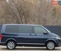 Синій Фольксваген Мультиван, об'ємом двигуна 2 л та пробігом 196 тис. км за 47999 $, фото 2 на Automoto.ua