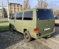Зелений Фольксваген Мультиван, об'ємом двигуна 2.5 л та пробігом 320 тис. км за 3800 $, фото 4 на Automoto.ua