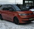 Помаранчевий Фольксваген Мультиван, об'ємом двигуна 2 л та пробігом 87 тис. км за 63800 $, фото 1 на Automoto.ua