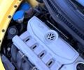 Желтый Фольксваген Нью Битл, объемом двигателя 2.5 л и пробегом 138 тыс. км за 6000 $, фото 2 на Automoto.ua