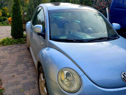 Синий Фольксваген Нью Битл, объемом двигателя 2 л и пробегом 221 тыс. км за 4500 $, фото 1 на Automoto.ua