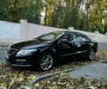 Черный Фольксваген Пассат СС, объемом двигателя 1.8 л и пробегом 243 тыс. км за 9399 $, фото 1 на Automoto.ua