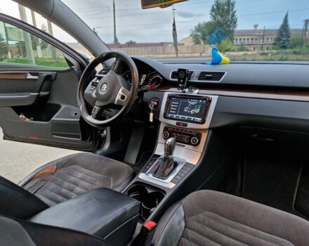 Чорний Фольксваген Пассат, об'ємом двигуна 2 л та пробігом 170 тис. км за 10999 $, фото 7 на Automoto.ua