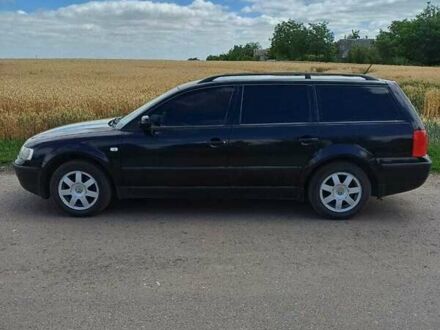 Черный Фольксваген Пассат, объемом двигателя 1.6 л и пробегом 200 тыс. км за 5000 $, фото 1 на Automoto.ua