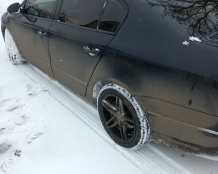 Чорний Фольксваген Пассат, об'ємом двигуна 2 л та пробігом 370 тис. км за 5200 $, фото 1 на Automoto.ua