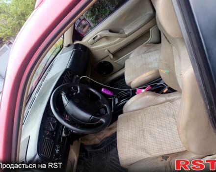 Красный Фольксваген Пассат, объемом двигателя 1.9 л и пробегом 385 тыс. км за 1500 $, фото 1 на Automoto.ua