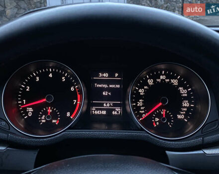 Красный Фольксваген Пассат, объемом двигателя 2 л и пробегом 144 тыс. км за 12999 $, фото 60 на Automoto.ua