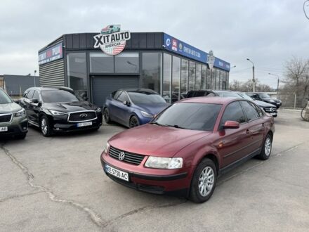 Красный Фольксваген Пассат, объемом двигателя 1.8 л и пробегом 315 тыс. км за 3000 $, фото 1 на Automoto.ua