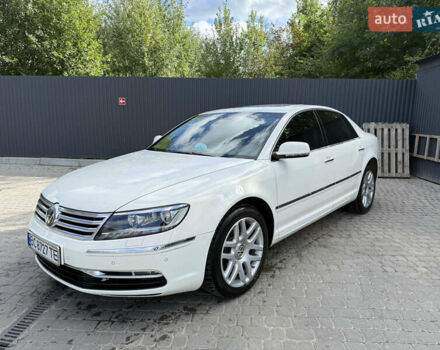 Фольксваген Фаетон 2013 в Львове на Automoto.ua Белый Фольксваген Фаетон, объемом двигателя 2.97 л и пробегом 245 тыс. км за 15950 $, фото 1 на Automoto.ua