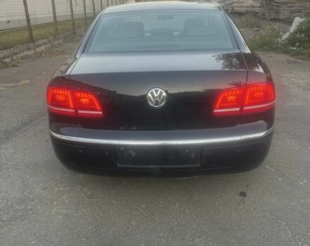 Черный Фольксваген Фаетон, объемом двигателя 3 л и пробегом 235 тыс. км за 5500 $, фото 1 на Automoto.ua