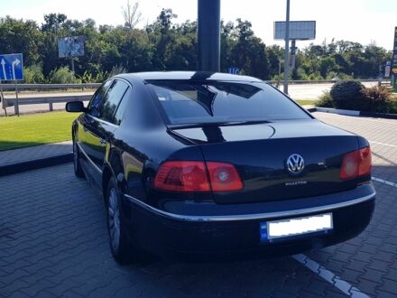 Черный Фольксваген Фаетон, объемом двигателя 3.2 л и пробегом 187 тыс. км за 10000 $, фото 1 на Automoto.ua