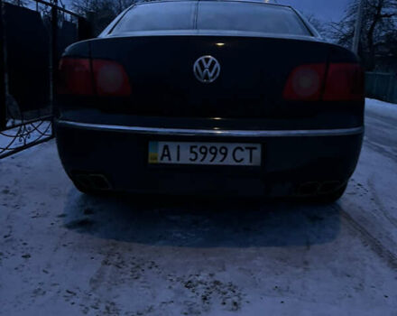 Черный Фольксваген Фаетон, объемом двигателя 4.9 л и пробегом 260 тыс. км за 7500 $, фото 1 на Automoto.ua