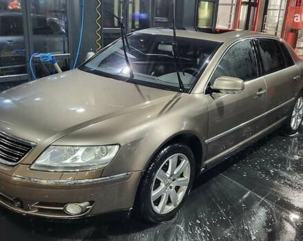 Коричневый Фольксваген Фаетон, объемом двигателя 4.2 л и пробегом 234 тыс. км за 8500 $, фото 1 на Automoto.ua