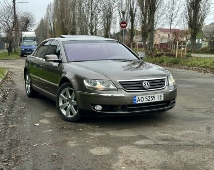 Коричневый Фольксваген Фаетон, объемом двигателя 4.2 л и пробегом 234 тыс. км за 5200 $, фото 1 на Automoto.ua