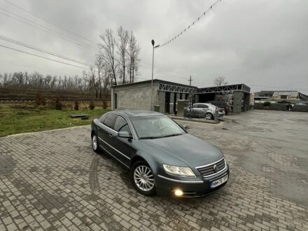 Синий Фольксваген Фаетон, объемом двигателя 3 л и пробегом 280 тыс. км за 3950 $, фото 1 на Automoto.ua