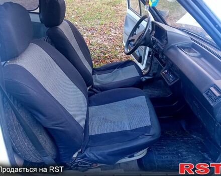 Белый Фольксваген Поло, объемом двигателя 1 л и пробегом 316 тыс. км за 600 $, фото 10 на Automoto.ua