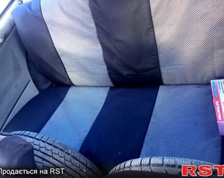 Белый Фольксваген Поло, объемом двигателя 1 л и пробегом 316 тыс. км за 600 $, фото 5 на Automoto.ua