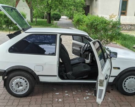 Белый Фольксваген Поло, объемом двигателя 1 л и пробегом 97 тыс. км за 1300 $, фото 1 на Automoto.ua