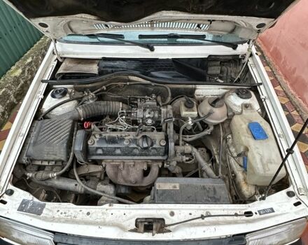 Білий Фольксваген Поло, об'ємом двигуна 1.4 л та пробігом 280 тис. км за 2300 $, фото 7 на Automoto.ua