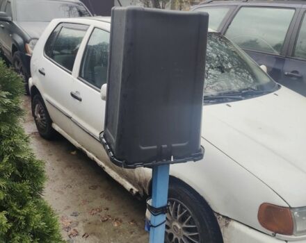 Белый Фольксваген Поло, объемом двигателя 1.4 л и пробегом 280 тыс. км за 1400 $, фото 1 на Automoto.ua