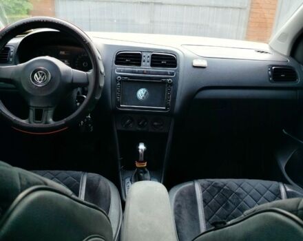 Белый Фольксваген Поло, объемом двигателя 1.4 л и пробегом 200 тыс. км за 6000 $, фото 1 на Automoto.ua