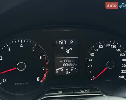 Білий Фольксваген Поло, об'ємом двигуна 1.39 л та пробігом 226 тис. км за 7350 $, фото 28 на Automoto.ua