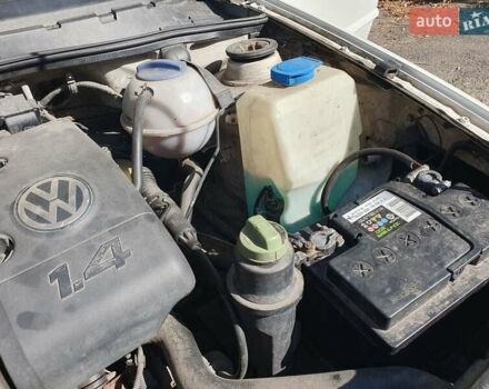 Білий Фольксваген Поло, об'ємом двигуна 1.39 л та пробігом 150 тис. км за 1700 $, фото 11 на Automoto.ua