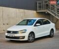 Белый Фольксваген Поло, объемом двигателя 1.39 л и пробегом 77 тыс. км за 10900 $, фото 1 на Automoto.ua