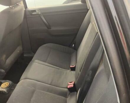 Черный Фольксваген Поло, объемом двигателя 1.4 л и пробегом 160 тыс. км за 4750 $, фото 10 на Automoto.ua